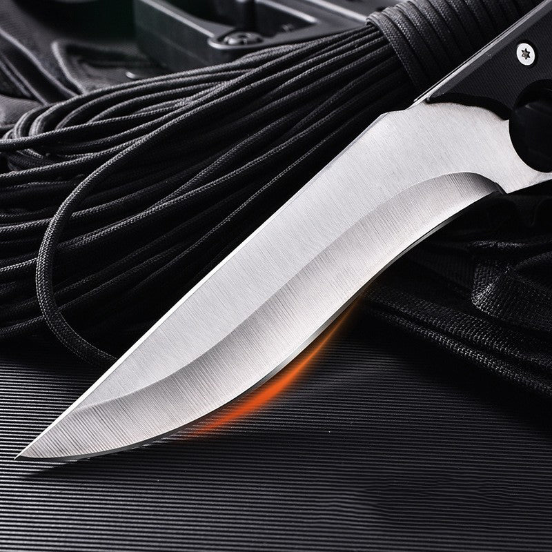 Strumento portatile da esterno a quattro dita color grigio argento